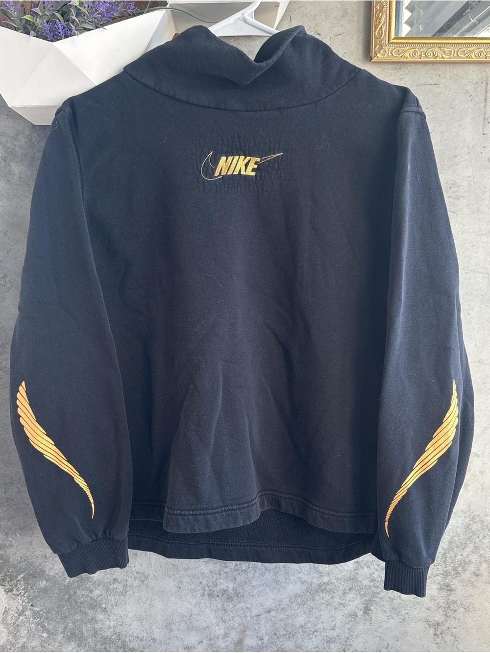 Nike Black Pullover with Gold Swoosh and Sleeve Wings